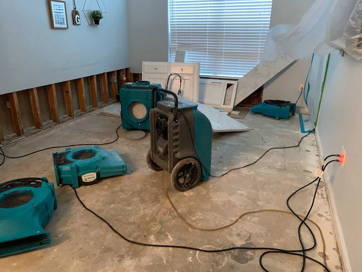 Dehumidifier in flood-cut room for Water Damage Restoration in Naples Manor